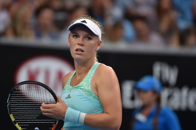 Agora, Caroline Wozniacki terá de fazer as malas e voltar para a casa (Foto: Paul Crock)