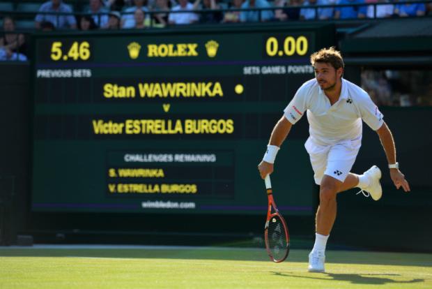 Stanislas Wawrinka passou sem sustos por Victor Estrella Burgos na segunda rodada em Londres