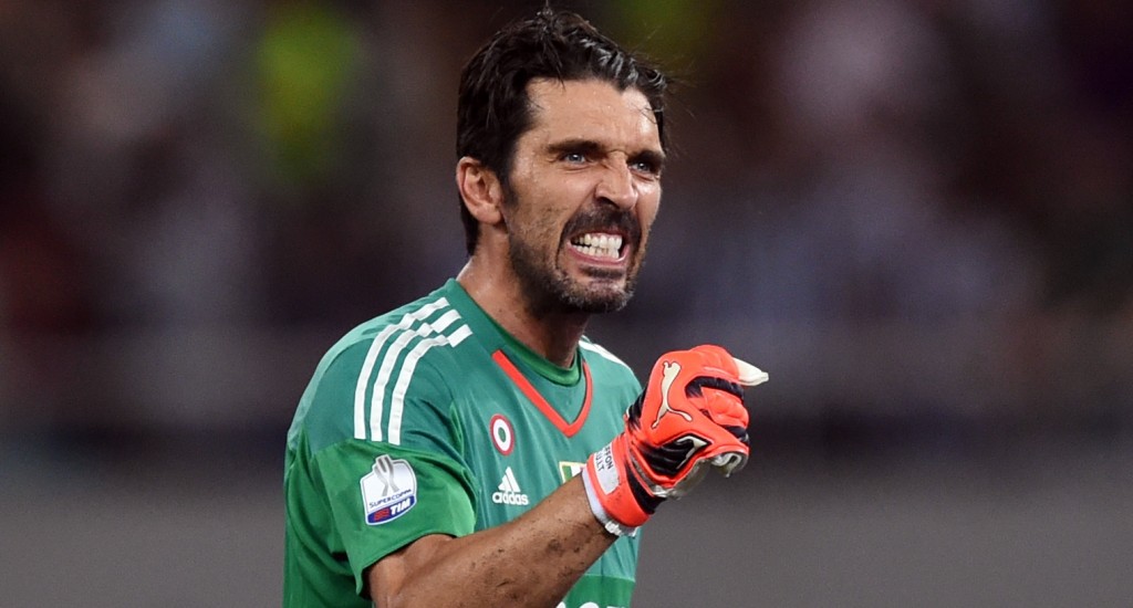 Juventus Italian goalkeeper Gianluigi Buffon celebrates his team's goal during the Italian Super Cup final football match between Juventus and Lazio in Shanghai on August 8, 2015.  AFP PHOTO / JOHANNES EISELE