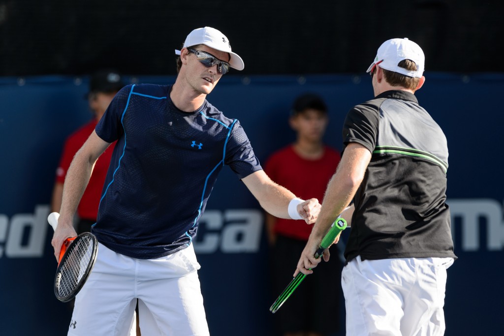 MONTREAL, ON - AUGUST 13: Jamie Murray of Great Britain encourages teammate John Peers of Australia during their doubles match against Leander Paes of India and Andy Murray of Great Britain on day four of the Rogers Cup at Uniprix Stadium on August 13, 2015 in Montreal, Quebec, Canada.   Minas Panagiotakis/Getty Images/AFP