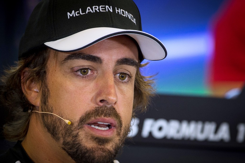 McLaren Honda's Spanish driver Fernando Alonso speaks during the drivers' press conference at the Spa-Francorchamps circuit on August 20, 2015 in Spa, three days ahead of the Formula One Belgian Grand Prix. AFP PHOTO / ANDREJ ISAKOVIC