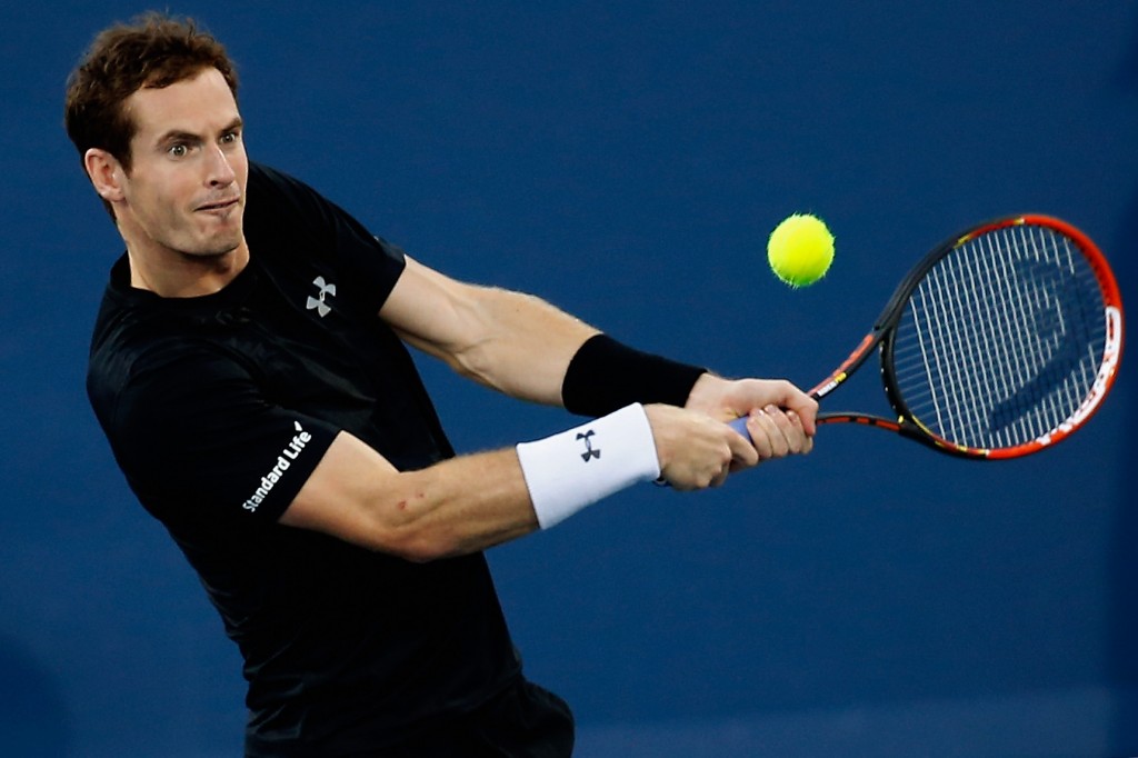CINCINNATI, OH - AUGUST 20: Andy Murray of Great Britain returns a shot to Grigor Dimitrov of Bulgaria during the Western & Southern Open at the Linder Family Tennis Center on August 20, 2015 in Cincinnati, Ohio.   Rob Carr/Getty Images/AFP