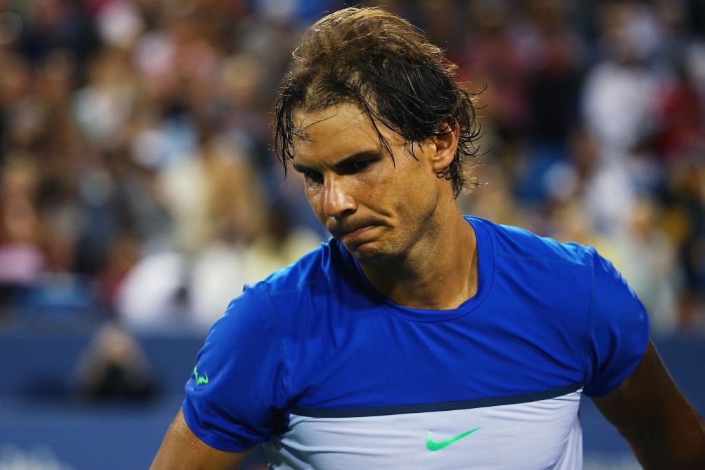 CINCINNATI, OH - AUGUST 20: Rafael Nadal of Spain reacts after losing his match against Feliciano Lopez of Spain during Day 6 of the Western & Southern Open at the Lindner Family Tennis Center on August 20, 2015 in Cincinnati, Ohio. Maddie Meyer/Getty Images/AFP