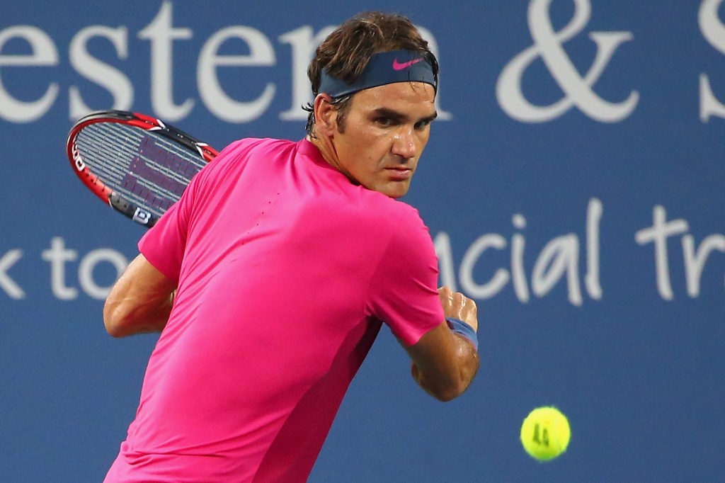 CINCINNATI, OH - AUGUST 18: Roger Federer of Switzerland returns a backhand to Roberto Bautista Agut of Spain during Day 4 of the Western & Southern Open at the Lidler Family Tennis Center on August 18, 2015 in Cincinnati, Ohio.   Maddie Meyer/Getty Images/AFP