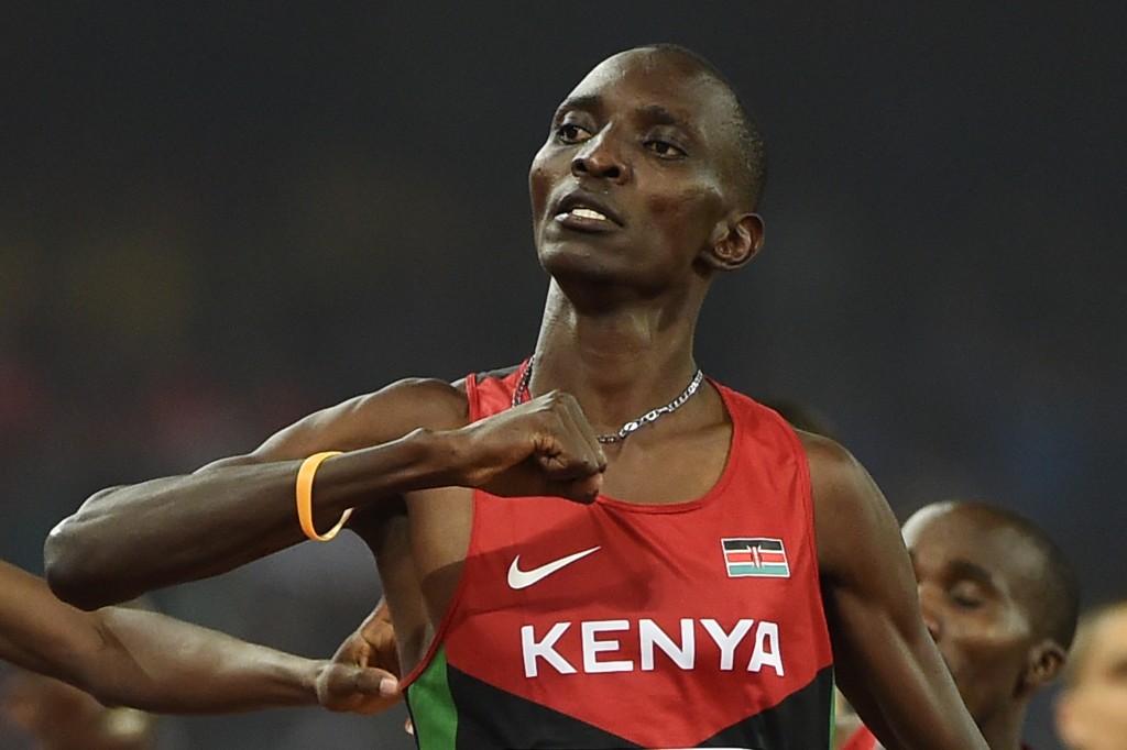 Kenya's Asbel Kiprop celebrates winning the final of the men's 1500 metres athletics event at the 2015 IAAF World Championships at the "Bird's Nest" National Stadium in Beijing on August 30, 2015.  AFP PHOTO / OLIVIER MORIN