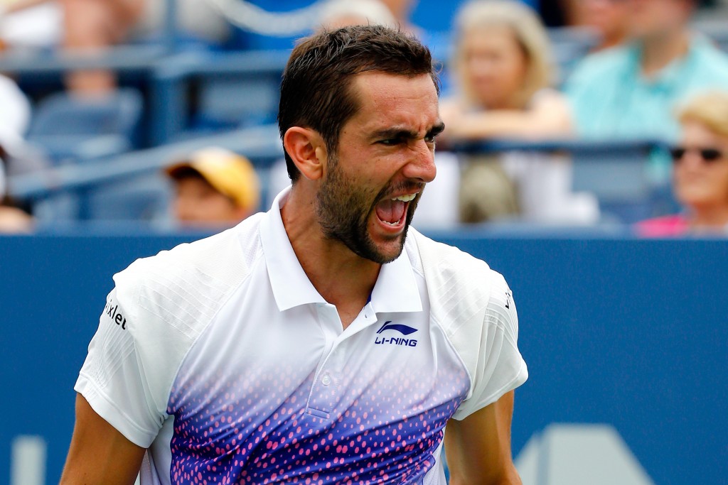 Croata Marin Cilic comemora ao vencer o cazaque Mikhail Kukushkin no Aberto dos Estados Unidos (Foto: Al Bello/Getty Images/AFP)