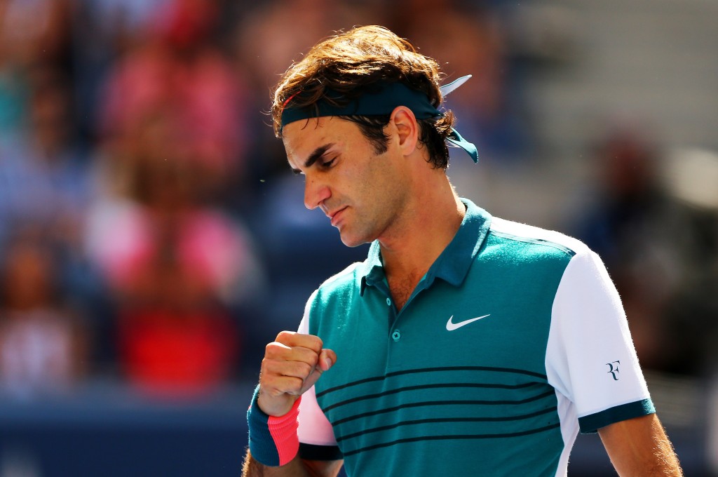 Em 1h35, Federer eliminou alemão e avançou às oitavas no Aberto dos EUA (Foto: Elsa/Getty Images/AFP)