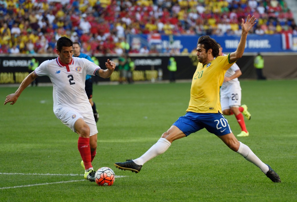 Brazil's Kaka (R) controls the ball in front of Costa Rica's Johnny Acosta during the friendly match between Brazil and Costa Rica September 5, 2015 at Red Bulls Arena in Harrison, New Jersey. AFP PHOTO/DON EMMERT