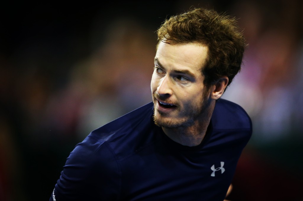 Britain's Andy Murray glances up during his reverse singles match against Bernard Tomic of Australia in the Davis Cup tennis semi-final between Great Britain and Australia in Glasgow, Scotland on September 20, 2015. AFP PHOTO / IAN MACNICOL