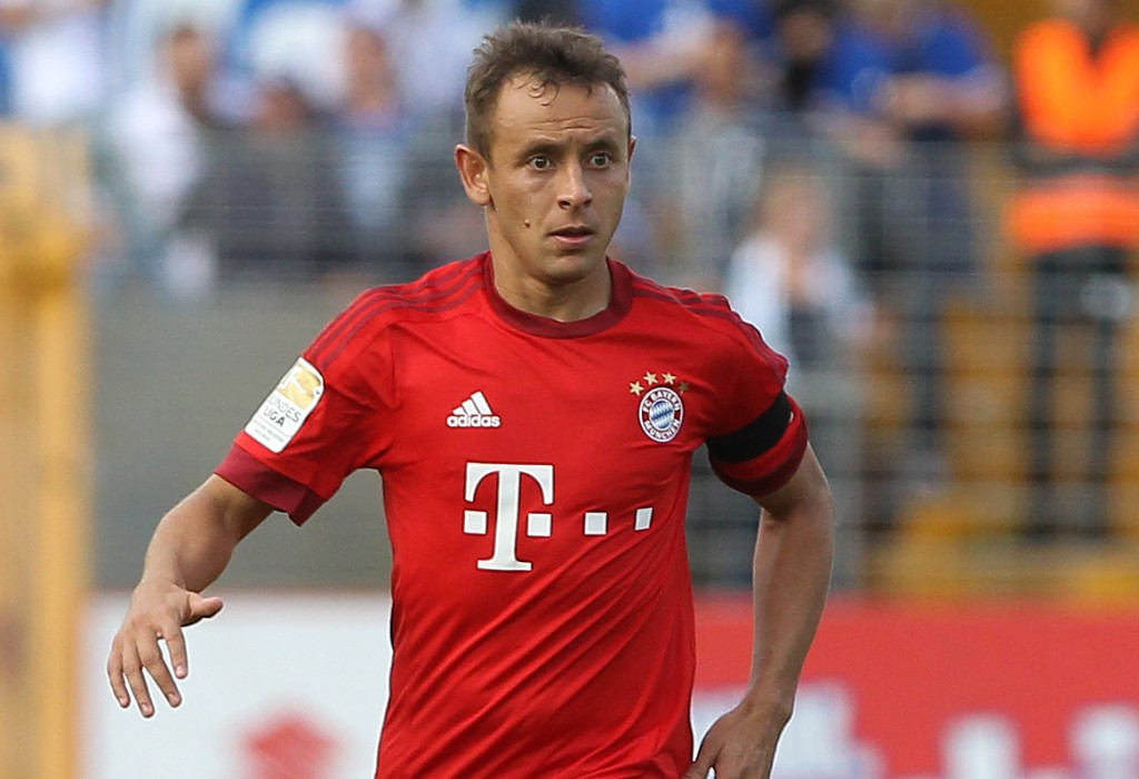 Bayern Munich's Brazilian defender Rafinha runs with the ball during the German first division Bundesliga football match SV Darmstadt 98 vs FC Bayern Munich in Darmstadt, western Germany on September 19, 2015.  AFP PHOTO / DANIEL ROLAND RESTRICTIONS: DURING MATCH TIME: DFL RULES TO LIMIT THE ONLINE USAGE TO 15 PICTURES PER MATCH AND FORBID IMAGE SEQUENCES TO SIMULATE VIDEO.  == RESTRICTED TO EDITORIAL USE ==  FOR FURTHER QUERIES PLEASE CONTACT DFL DIRECTLY AT + 49 69 650050.