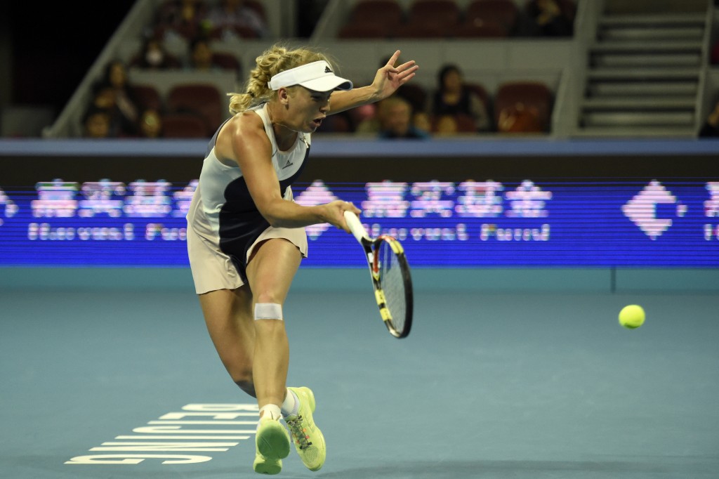 A dinamarquesa Caroline Wozniacki foi derrotada pela alemã Angelique Kerber e foi eliminada do Premier de Pequim (Foto: Fred Dufour/AFP)