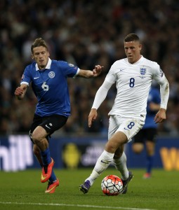 England's midfielder Ross Barkley (R) vies for the ball against Estonia's Aleksandr Dmitrijev during the Euro 2016 qualifying group E football match between England and Estonia at Wembley Stadium in north London on October 9, 2015. AFP PHOTO / ADRIAN DENNIS NOT FOR MARKETING OR ADVERTISING USE / RESTRICTED TO EDITORIAL USE