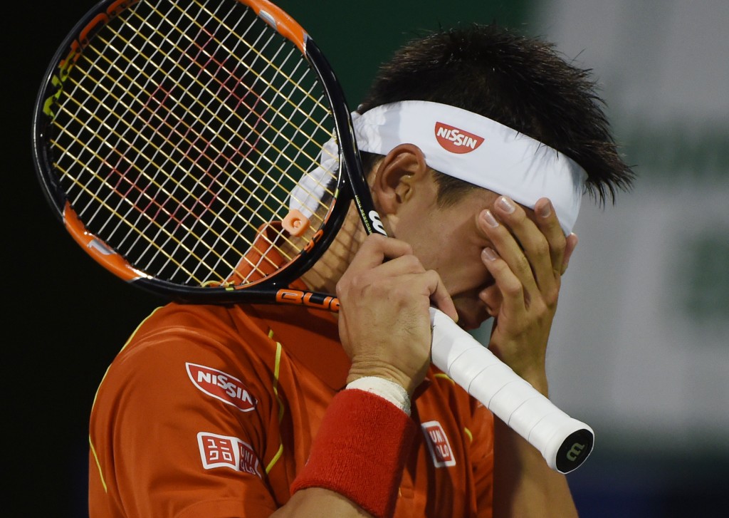 Nishikori perdeu a invencibilidade contra Anderson e foi eliminado em Xangai (foto: Greg Baker/AFP)
