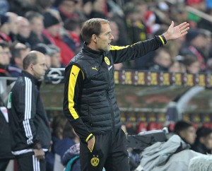 Dortmund's head coach Thomas Tuchel reacts during the German first division Bundesliga football match FSV Mainz 05 vs Borussia Dortmund in Mainz, western Germany, on October 16, 2015. AFP PHOTO / DANIEL ROLAND RESTRICTIONS: DURING MATCH TIME: DFL RULES TO LIMIT THE ONLINE USAGE TO 15 PICTURES PER MATCH AND FORBIDS IMAGE SEQUENCES TO SIMULATE VIDEO. == RESTRICTED TO EDITORIAL USE == FOR FURTHER QUERIES PLEASE CONTACT DFL DIRECTLY AT + 49 69 650050.