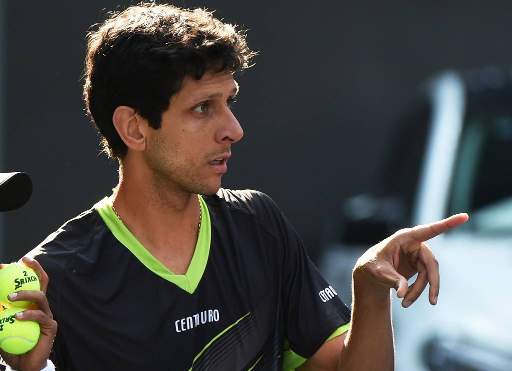 Ao lado de Lukasz Kubot, Marcelo Melo avançou à semi em Viena e será número 1 no ranking (Foto: Greg Baker/AFP)