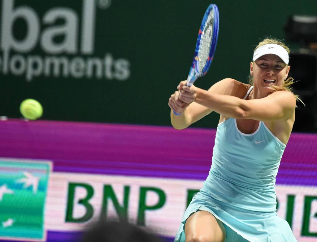 A russa Maria Sharapova se classificou de modo invicto às semifinais do WTA Finals (Foto: Roslan Rahman/AFP)