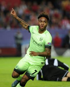 Manchester City's English midfielder Raheem Sterling celebrates after scoring during the UEFA Champions League football match Sevilla FC vs Manchester City at the Ramon Sanchez Pizjuan stadium in Sevilla on November 3, 2015. AFP PHOTO / CRISTINA QUICLER
