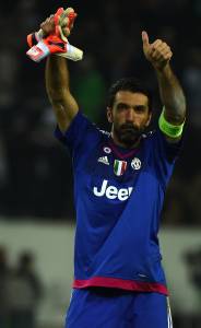 Juventus' goalkeeper Gianluigi Buffon reacts after the UEFA Champions League Group D, second-leg football match Borussia Moenchengladbach vs Juventus in Moenchengladbach, western Germany on November 3, 2015. The match ended with a 1-1 draw. AFP PHOTO / PATRIK STOLLARZ
