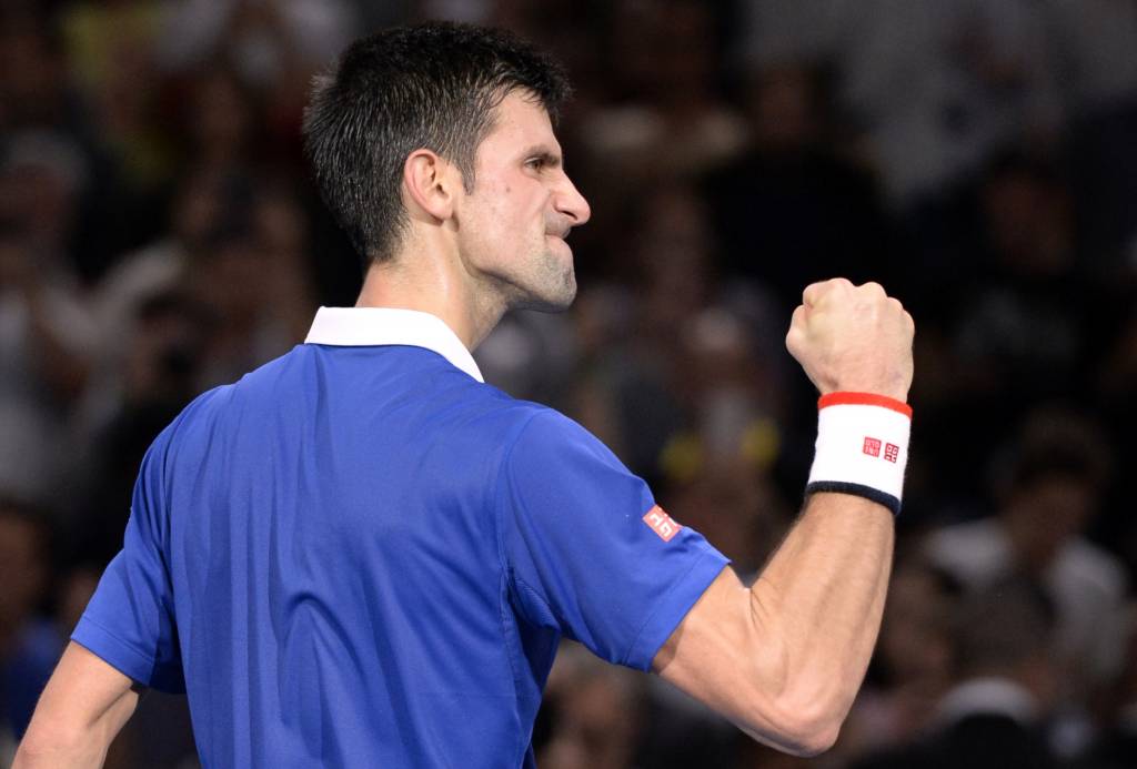 Após sofrer empate, Djokovic aplicou um pneu para vencer Wawrinka (foto: Miguel Medina/AFP)