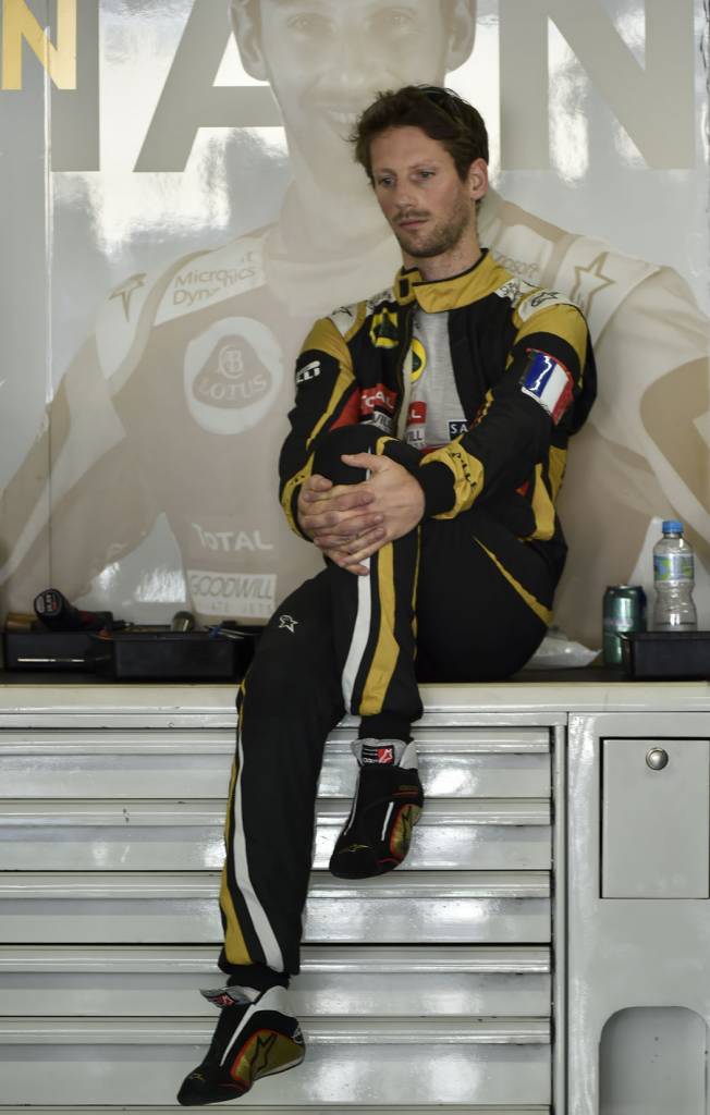 Grosjean utilizou braçadeira da França em São Paulo(Foto: Miguel Schincariol/AFP)