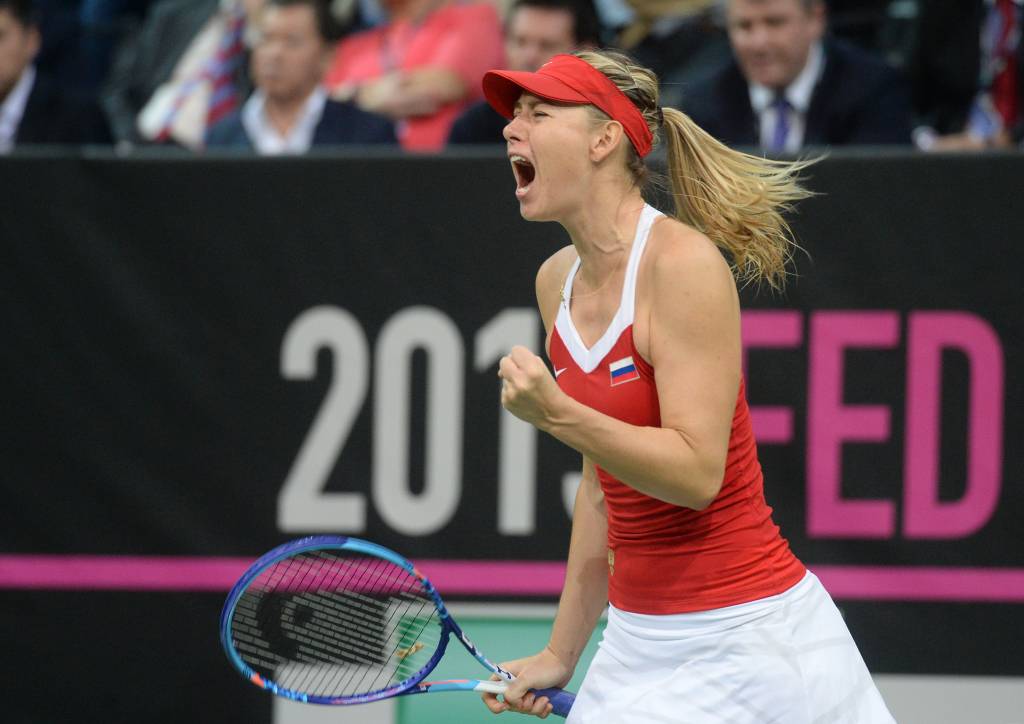 Maria Sharapova derrotou a tcheca Petra Kvitova de virada neste domingo (Foto: Michal Cizek/AFP)