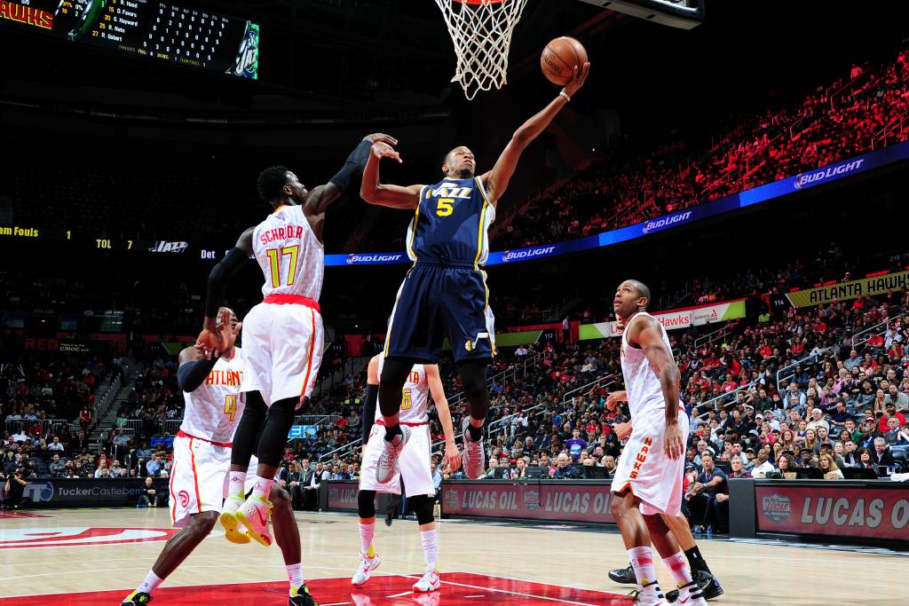 ATLANTA, GEORGIA - NOVEMBER 15: Rodney Hood #5 of the Utah Jazz goes for the lay up against the Atlanta Hawks during the game on November 15, 2015 at Philips Center in Atlanta, Georgia. NOTE TO USER: User expressly acknowledges and agrees that, by downloading and or using this Photograph, user is consenting to the terms and conditions of the Getty Images License Agreement. Mandatory Copyright Notice: Copyright 2015 NBAE   Scott Cunningham/NBAE via Getty Images/AFP