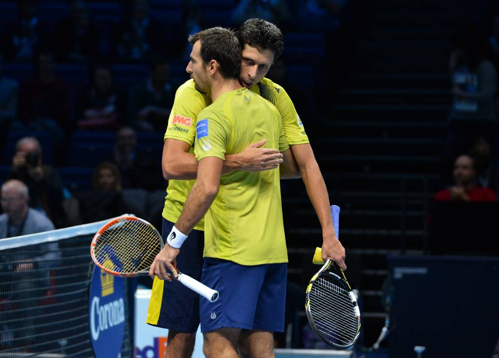 Ivan Dodig e Marcelo Melo foram derrotados em Londres (Foto: Glyn Kirk/AFP)