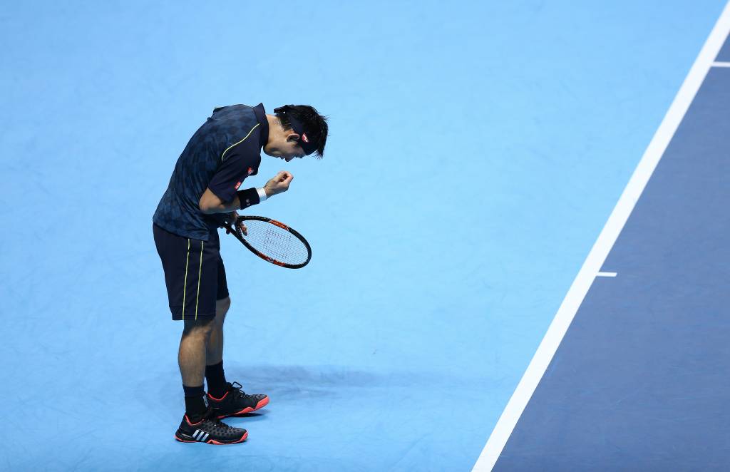 Kei Nishikori promoveu uma boa disputa contra Federer, mas acabou derrota (Foto: Justin Tallis/AFP)
