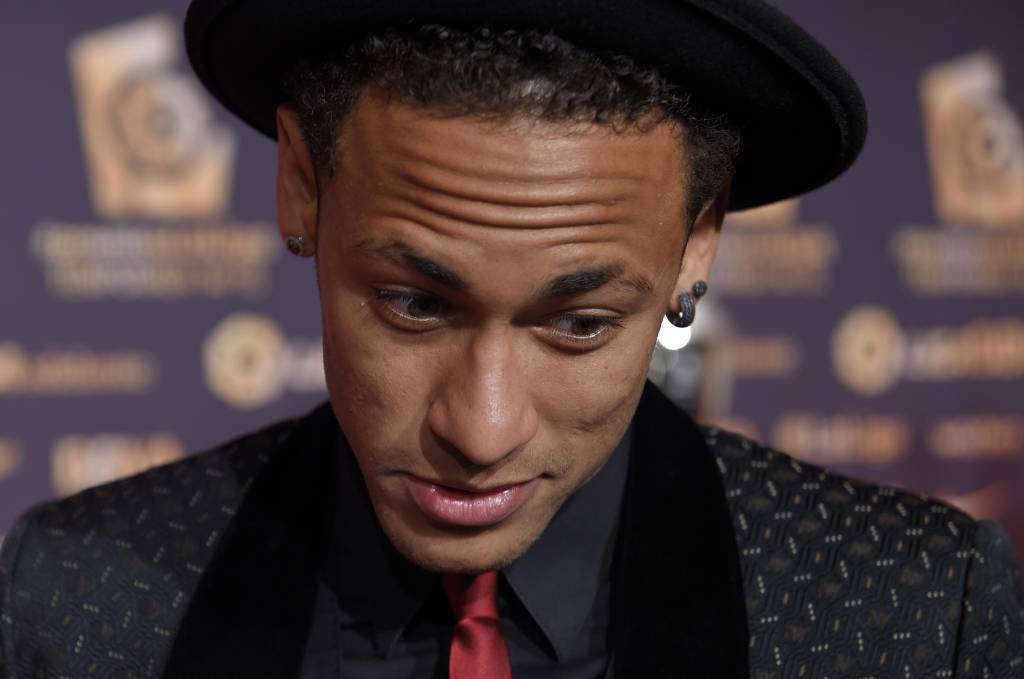 Neymar recebe quantias milionárias pela utilização de seu nome e imagem (Foto: Lluis Gene/AFP)