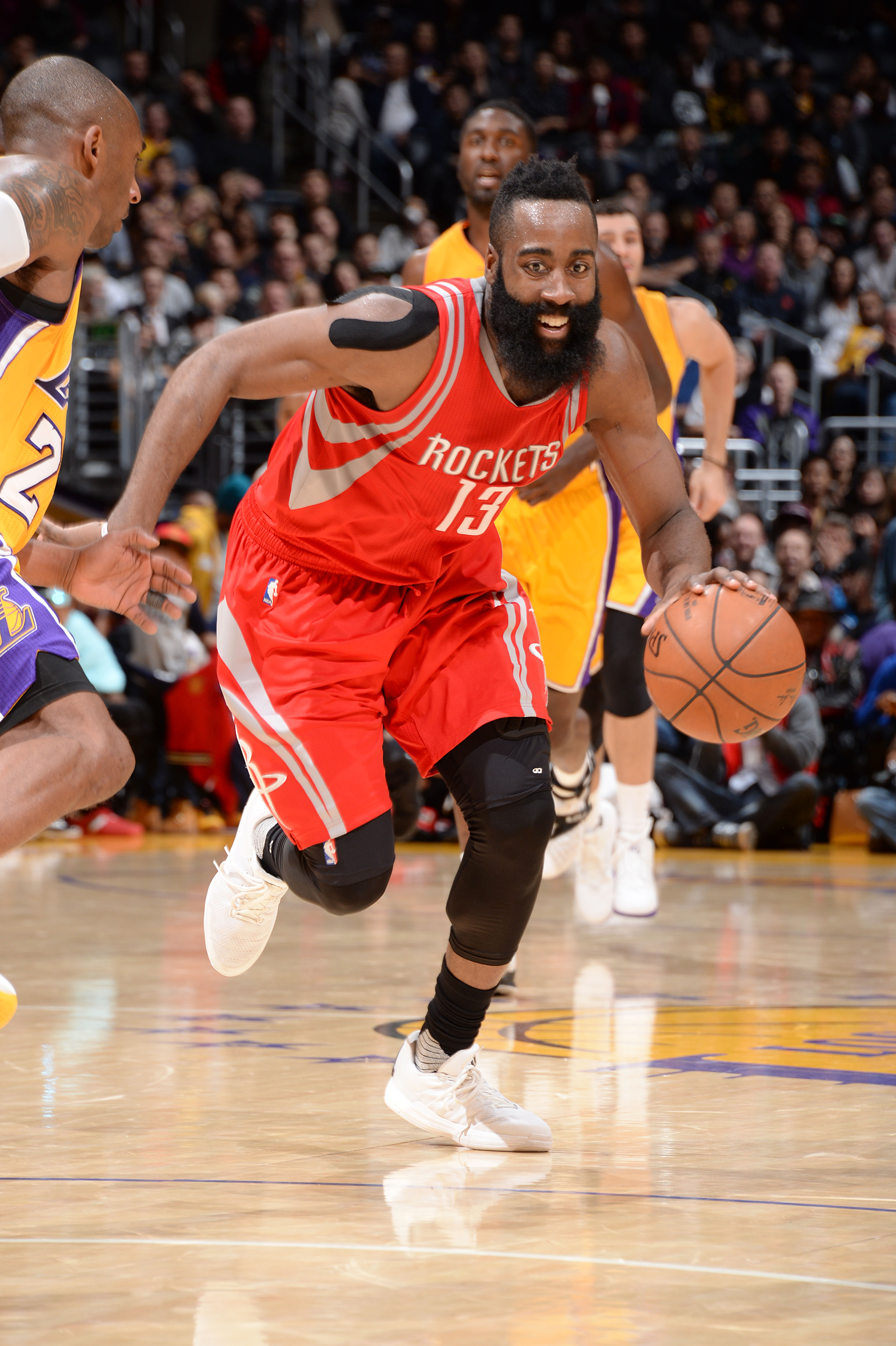 James Harden também foi decisivo para os Rockets (Foto: Andrew D. Bernstein/AFP)