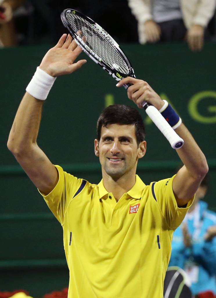 Novak Djokovic celebra vitória na estreia do ATP 250 de Doha (Foto: Karim Jaafar/AFP)