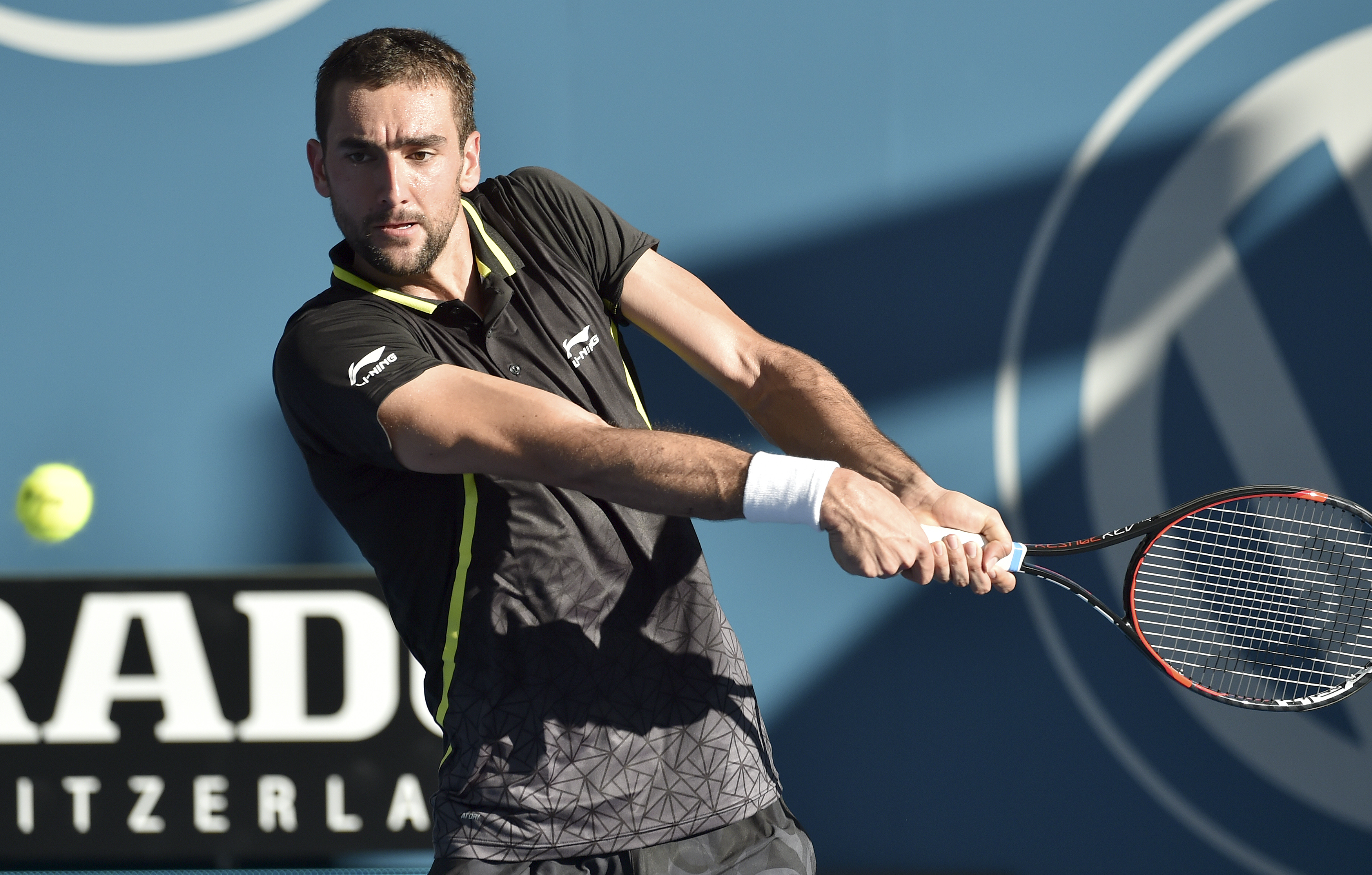 Marin Cilic teve dificuldades, mas também avançou em Brisbane (Foto: SAEED KHAN/AFP)