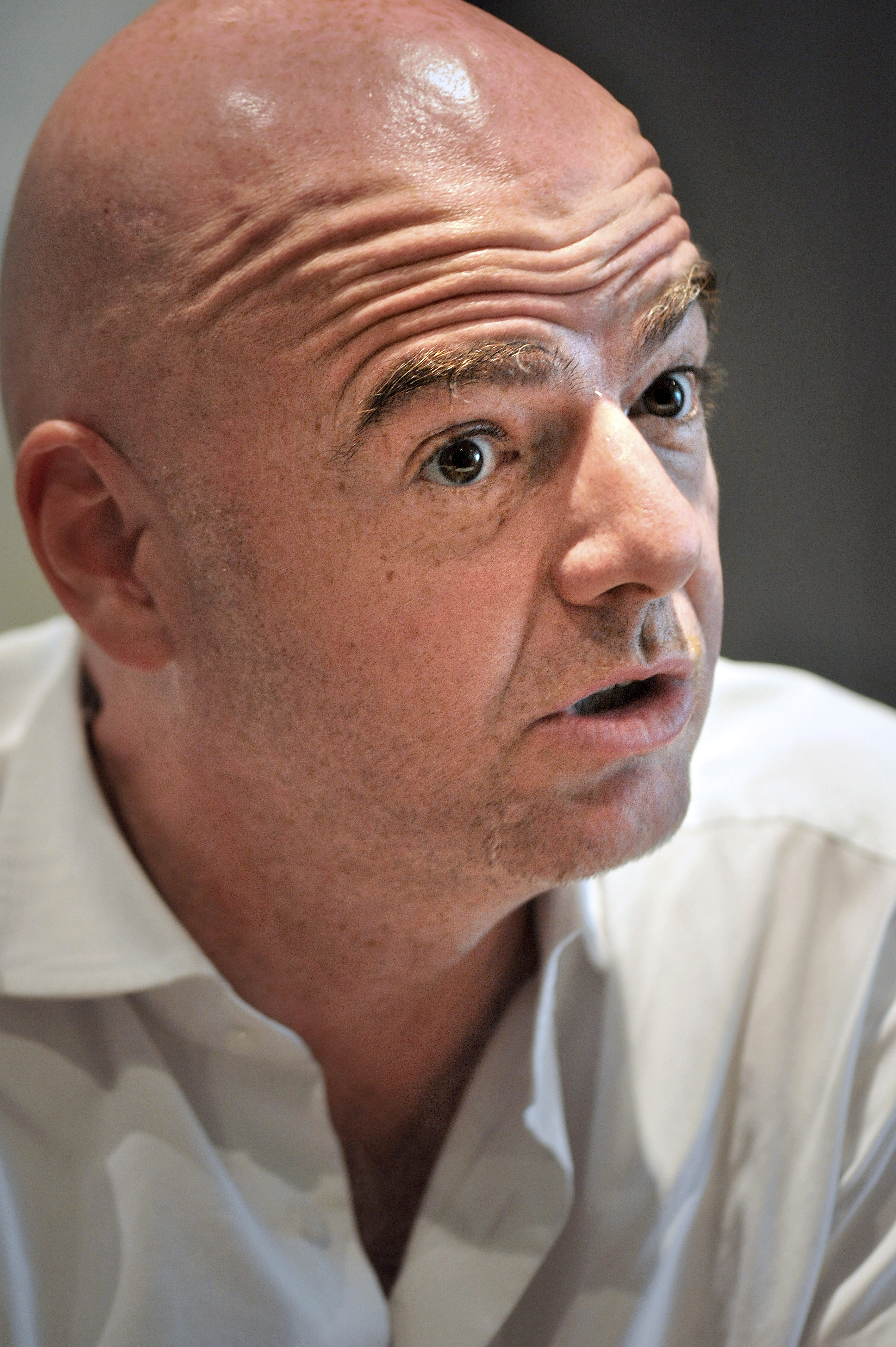 Gianni Infantino, general secretary of the European soccer federation UEFA and candidate for the presidency of world football's governing body FIFA, addresses the media in Cape Town on February 22, 2016, after visiting Robben Island. / AFP / Rodger BOSCH