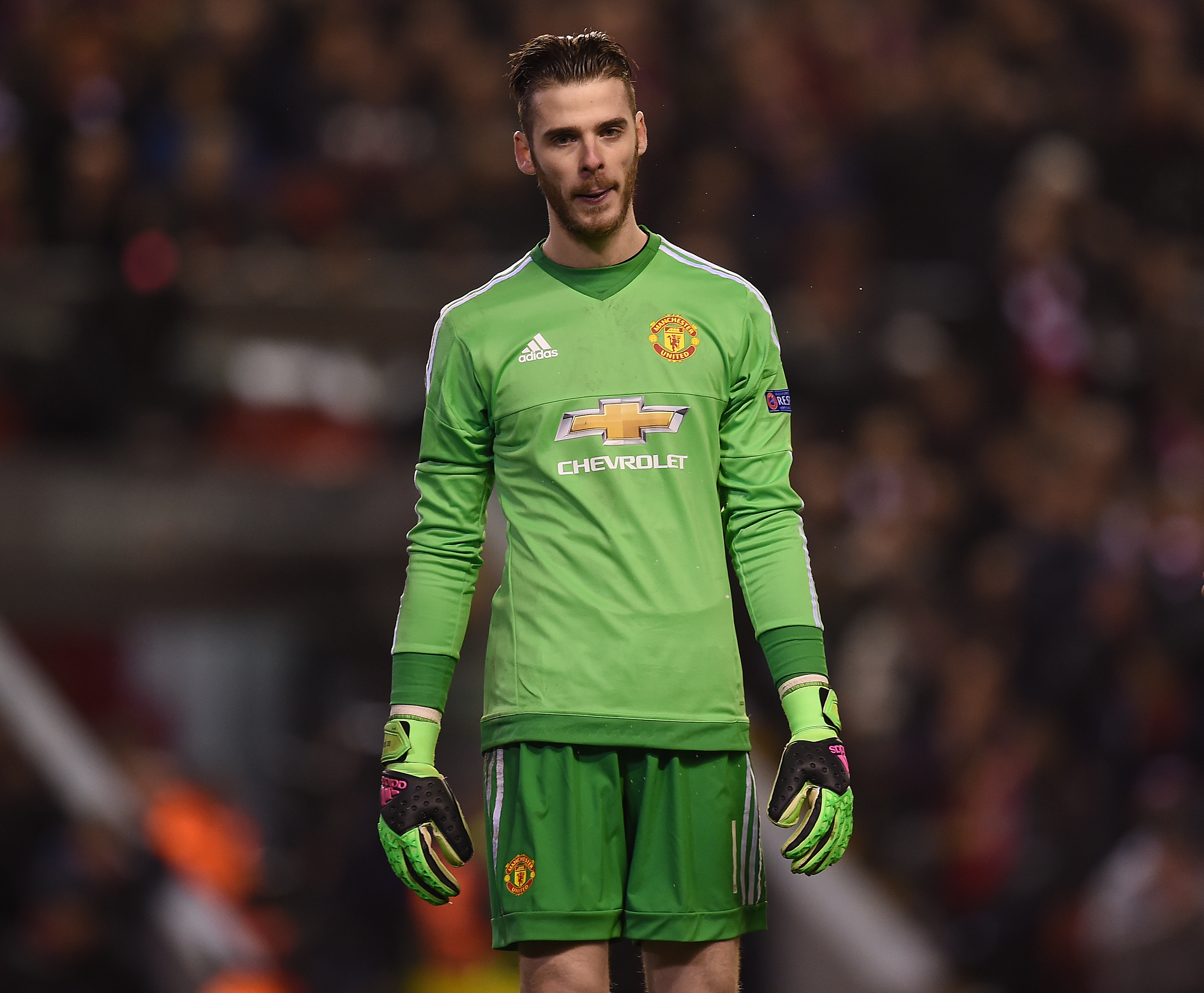 Manchester United's Spanish goalkeeper David de Gea reacts during the UEFA Europa League round of 16, first leg football match between Liverpool and Manchester United at Anfield in Liverpool, northwest England on March 10, 2016. / AFP / PAUL ELLIS