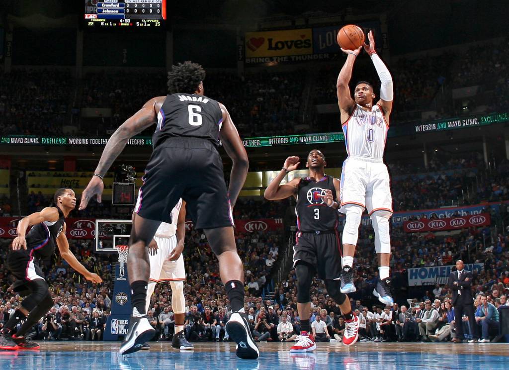 OKLAHOMA CITY, OK - MARCH 9: Russell Westbrook #0 of the Oklahoma City Thunder shoots against the Los Angeles Clippers on March 9, 2016 at Chesapeake Energy Arena in Oklahoma City, Oklahoma. NOTE TO USER: User expressly acknowledges and agrees that, by downloading and or using this photograph, User is consenting to the terms and conditions of the Getty Images License Agreement. Mandatory Copyright Notice: Copyright 2016 NBAE   Layne Murdoch Jr./NBAE via Getty Images/AFP