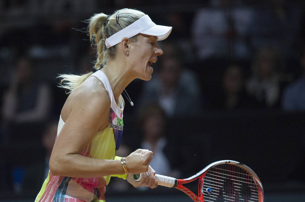 Germany's Angelique Kerber reacts during the final match against Germany's Laura Siegemund at the WTA Porsche Tennis Grand Prix in Stuttgart, southwestern Germany, on April 24, 2016.  / AFP PHOTO / THOMAS KIENZLE