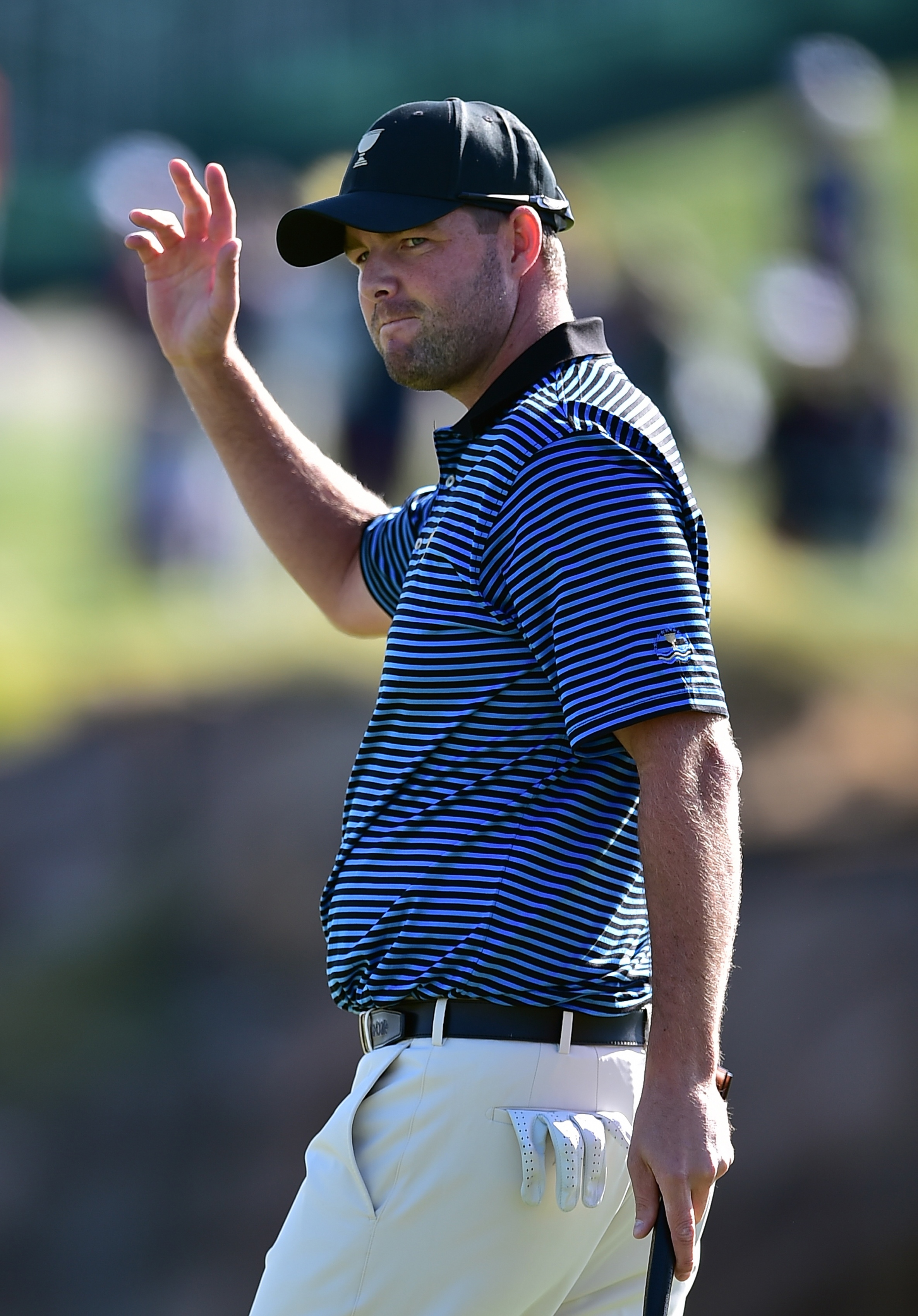 Marc Leishman optou por não vir ao Brasil para garantir saúde da esposa (Foto: JUNG YEON-JE/AFP)