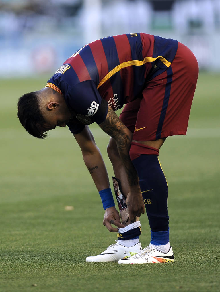 Revelado no Santos, Neymar reforçou o Barça em julho de 2013 (Foto: Cristina Quicler/AFP)