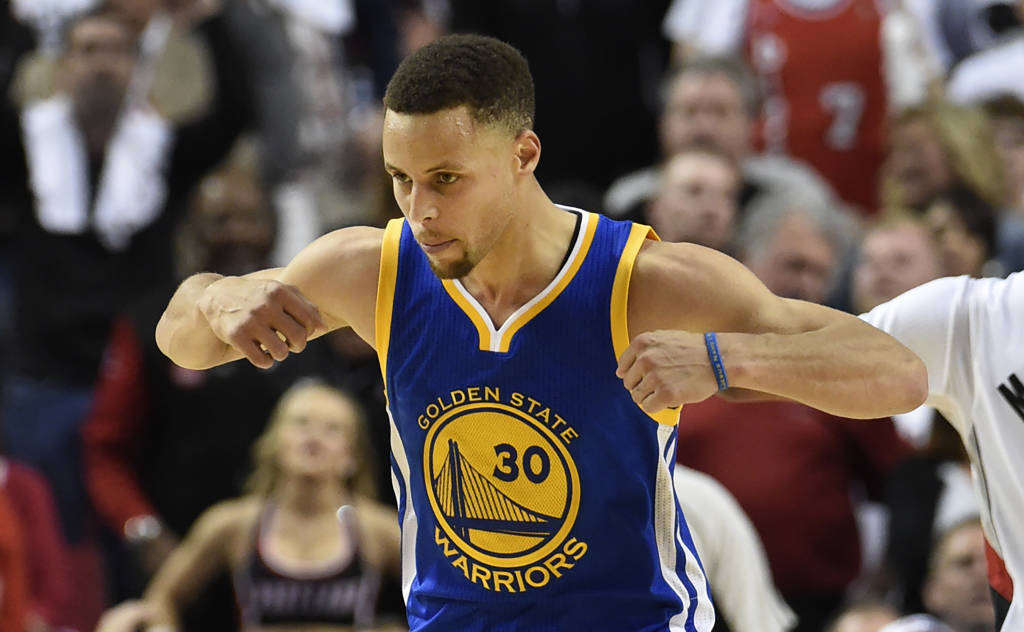 Curry tem 28 anos (Foto: Steve Dykes/AFP)