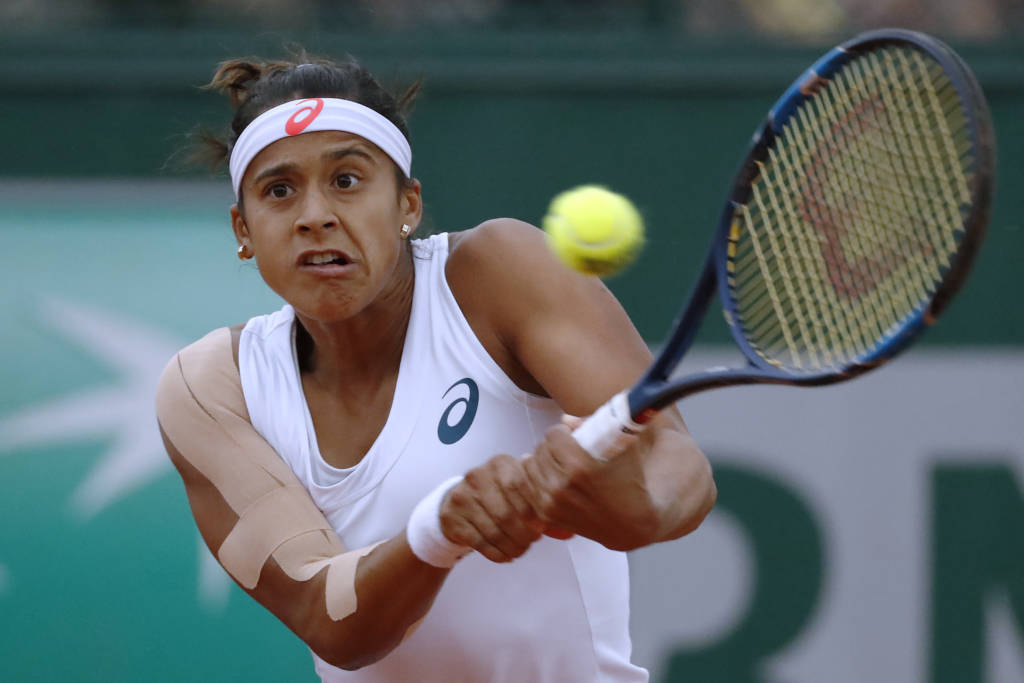 Teliana marcou três games contra a melhor tenista do mundo (Foto: Thomas Samson/AFP)