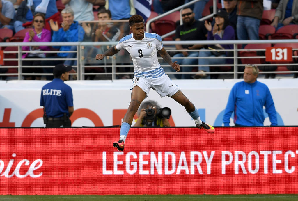 SANTA CLARA, CA - JUNE 13: Abel Hernandez #8 of Uruguay celebrates after scoring a goal against Jamaica during the 2016 Copa America Centenario Group match play between Uruguay and Jamaica at Levi's Stadium on June 13, 2016 in Santa Clara, California.   Thearon W. Henderson/Getty Images/AFP