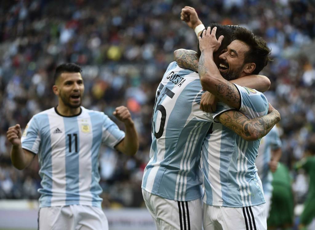 Argentina's Ezequiel Lavezzi (R) celebrates with Victor Cuesta after scoring against Bolivia during the Copa America Centenario football tournament match in Seattle, Washington, United States, on June 14, 2016.  / AFP PHOTO / OMAR TORRES