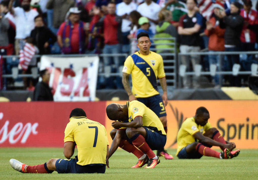 Players of Ecuador show their dejection after being defeated by the United States 2-1 in their Copa America Centenario football tournament quarterfinal match, in Seattle, Washington, United States, on June 16, 2016. / AFP PHOTO / Omar Torres