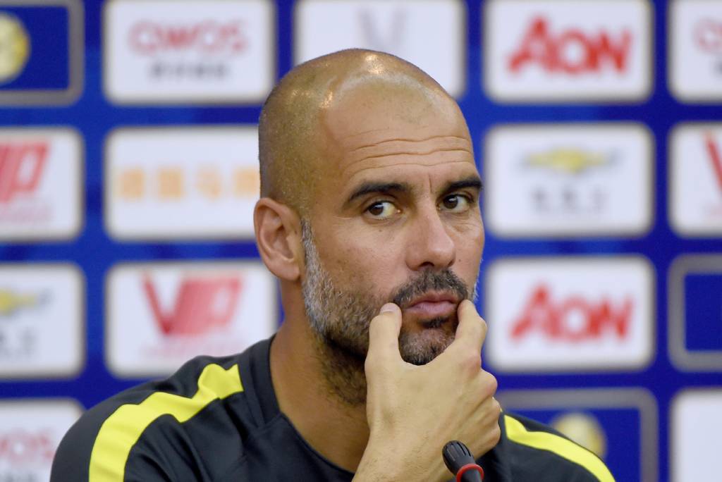 O novo técnico do Manchester City, Pep Guardiola, admitiu que ainda pretende trazer reforços para a equipe (Foto: Wang Zhao/AFP)