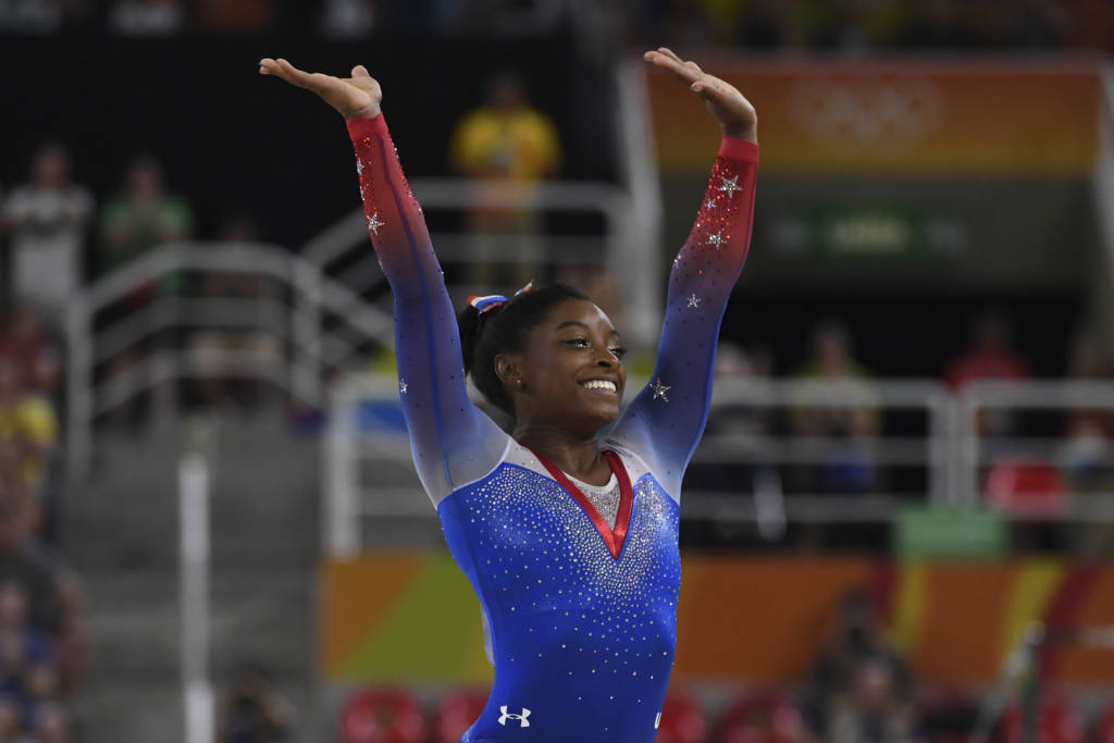 US gymnast Simone Biles competes in the women's floor event final of the Artistic Gymnastics at the Olympic Arena during the Rio 2016 Olympic Games in Rio de Janeiro on August 16, 2016. / AFP PHOTO / Toshifumi KITAMURA
