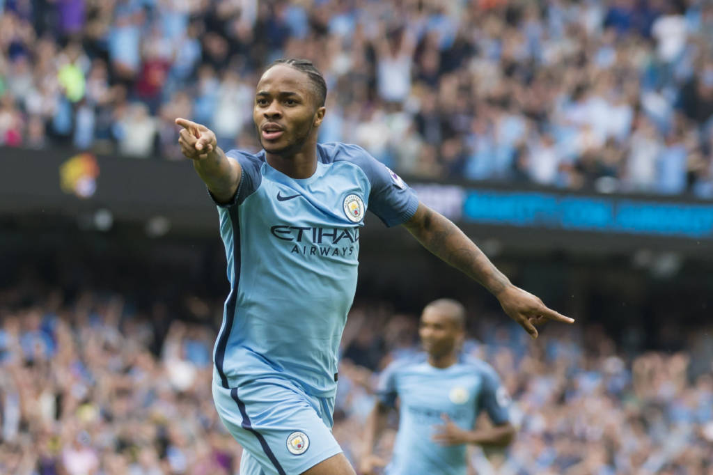 Manchester City's English midfielder Raheem Sterling celebrates after scoring the opening goal of the English Premier League football match between Manchester City and West Ham United at the Etihad Stadium in Manchester, north west England, on August 28, 2016. / AFP PHOTO / JON SUPER / RESTRICTED TO EDITORIAL USE. No use with unauthorized audio, video, data, fixture lists, club/league logos or 'live' services. Online in-match use limited to 75 images, no video emulation. No use in betting, games or single club/league/player publications. /