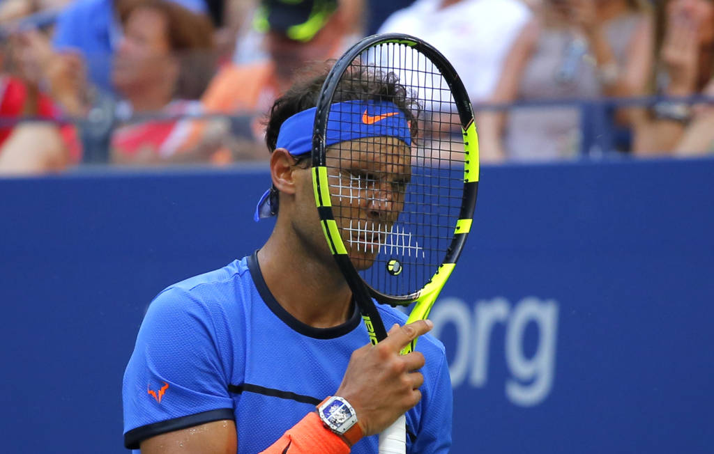 Nadal lutou bastante, mas sucumbiu diante de um adversário muito forte física e mentalmente (Foto: Kena Betancur/AFP)