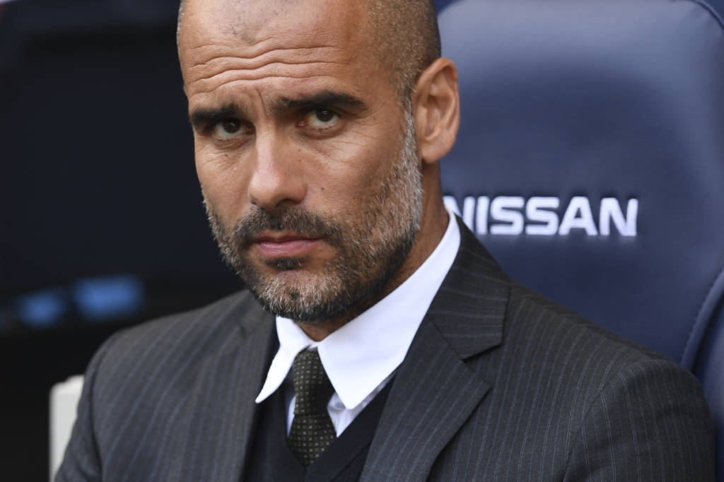 O técnico Pep Guardiola (Foto: Paul Ellis/AFP)