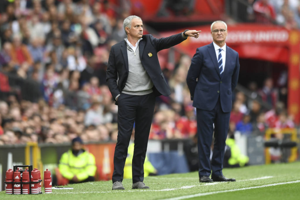 Manchester United's Portuguese manager Jose Mourinho (C) gestures from the touchline next to Leicester City's Italian manager Claudio Ranieri (R) during the English Premier League football match between Manchester United and Leicester City at Old Trafford in Manchester, north west England, on September 24, 2016. / AFP PHOTO / ANTHONY DEVLIN / RESTRICTED TO EDITORIAL USE. No use with unauthorized audio, video, data, fixture lists, club/league logos or 'live' services. Online in-match use limited to 75 images, no video emulation. No use in betting, games or single club/league/player publications.  /