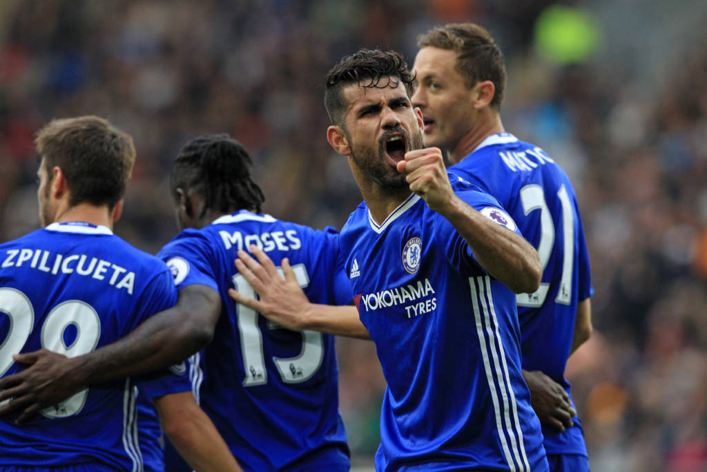Chelsea's Brazilian-born Spanish striker Diego Costa (2nd R) celebrates scoring their second goal during the English Premier League football match between Hull City and Chelsea at the KCOM Stadium in Kingston upon Hull, north east England on October 1, 2016. / AFP PHOTO / Lindsey PARNABY / RESTRICTED TO EDITORIAL USE. No use with unauthorized audio, video, data, fixture lists, club/league logos or 'live' services. Online in-match use limited to 75 images, no video emulation. No use in betting, games or single club/league/player publications. /